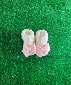 Scarpina nascita bianca con fiocco rosa