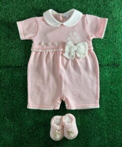 Pagliaccetto in filo rosa con fiocco