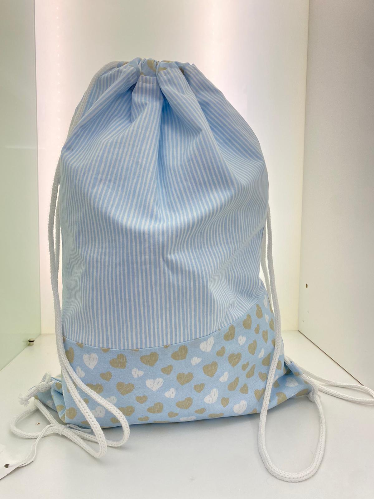 Sacco porta cambio celeste e bianco con cuoricini