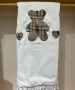 Copertina con orso tartan
